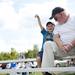 A young viewer gestures a dive motion with his hand while watching RC planes at the Flying Pilgrims Radio Control Club event on Sunday. Daniel Brenner I AnnArbor.com